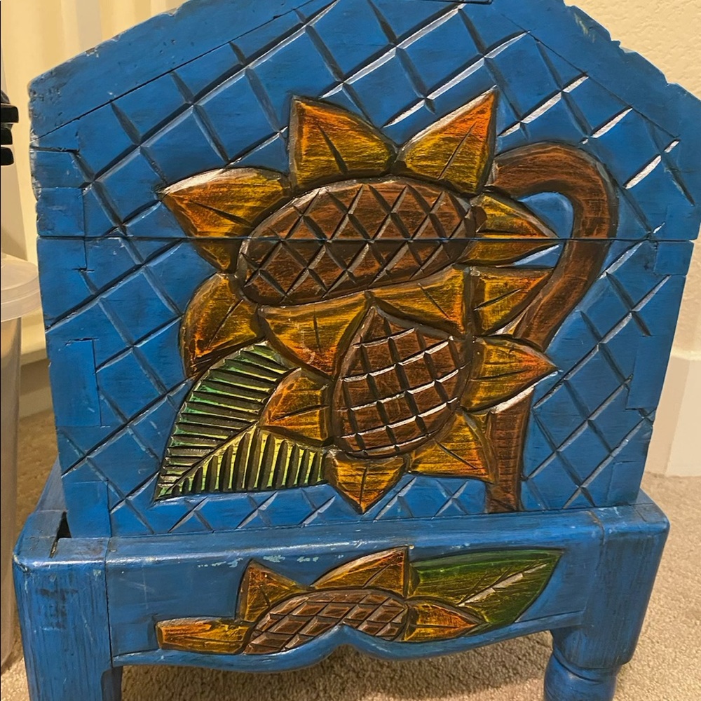 It’s a small chest and beautiful color yellow, brown, green, and blue…